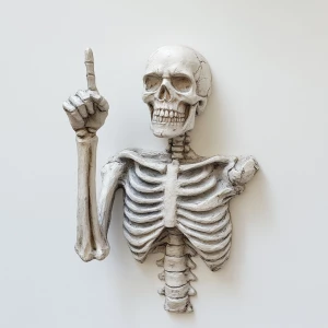3d bas relief of a skeleton against a white wall, holding his mi...