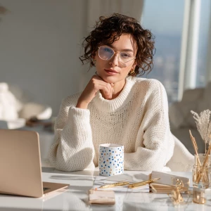 Female entrepreneur at her chic home office desk, 11oz ceramic m...