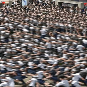 480p amateur video screengrab of a massive amount of students st...