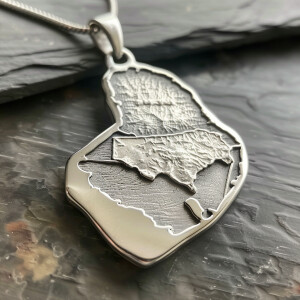Sterling silver pendant featuring an outline of the map of Texas...
