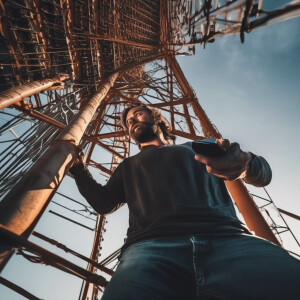 man climbing a 150 foot cell phone tower, Photoshoot, DSLR, Top-...
