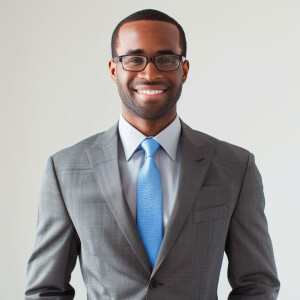 A man wearing a suit.
The Suit Color is gray
The Tie Color is...