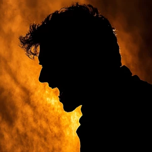 An outline of a man in silhouette form, captured with a visibly...