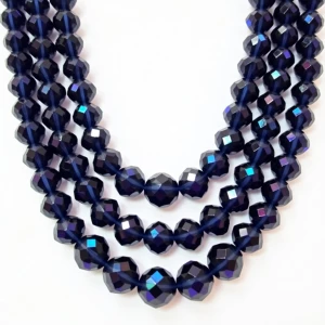 Design a triple-strand necklace with graduated navy blue faceted...