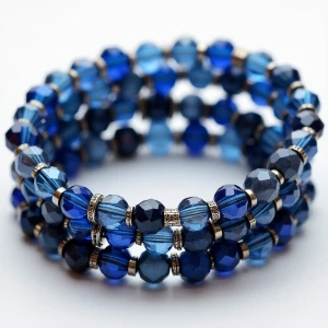 A sophisticated wrap bracelet combining the iridescent blue crys...