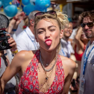 Miley Cyrus acting playfully and making funny faces at a lively...
