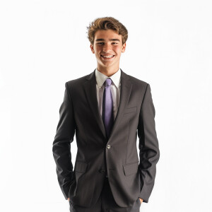 A man wearing a suit.

The Suit Color is Gray

The Tie Color is...