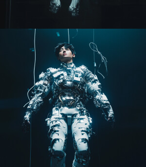 A asian high fashion model floating in zero gravity a muscular m...