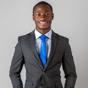 A man wearing a suit.

The Suit Color is Dark Gray

The Tie Colo...