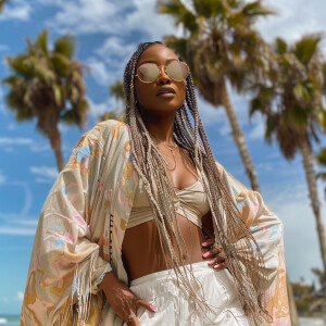 3-D image of a beautiful African-American woman HER SKIN IS A LI...