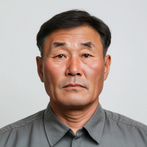 A 55-year-old North Korean man with a clean-shaven face, looking...