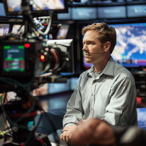 High resolution. Meteorologist reports weather on tv!