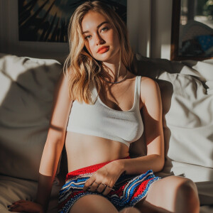 Photo of fair skinned young woman influencer with petite frame,...