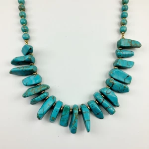 Turquoise Terrain"
"A statement necklace featuring raw turquoise...
