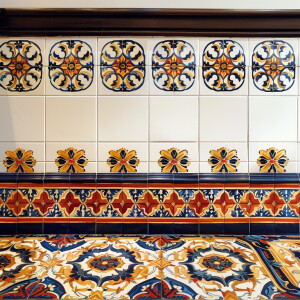 a spanish style tile border design on white background