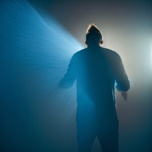 Hyper realistic image of a man screaming while standing with his...