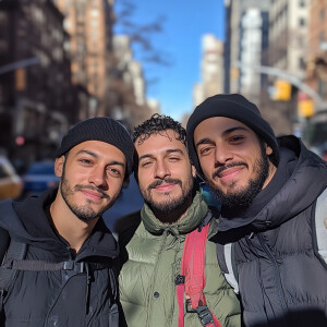 3 guys. Two portuguese and a Brazilian lost in NYC