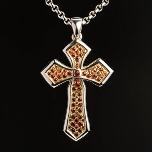Elegant sterling silver cross pendant featuring a stunning gold...
