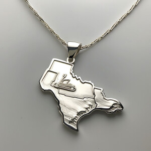 Sterling silver pendant featuring an outline of the map of Texas...