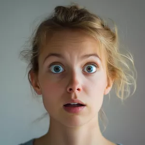 A woman with a little quizzical expression who has just discover...