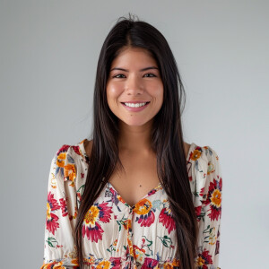 A cute woman

Smiling 

Clothes: Floral Dress

Looks Clean & Mod...