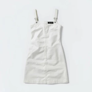 Create a captivating flat lay composition featuring a white jean...