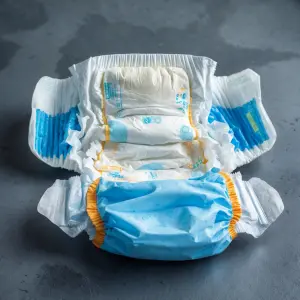 A diaper getting used by a boy