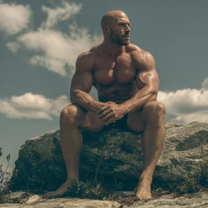 A close-up image of a muscular white man with a bodybuilder phys...