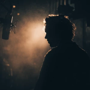 Create a dramatic movie trailer voiceover with a deep, powerful...