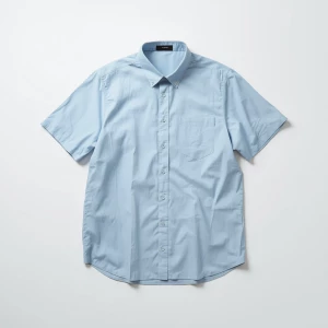 Produce an elegant flat lay image featuring a basic lightblue sh...