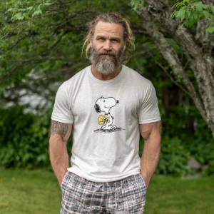 The image shows a 45 year old man bodybuilder with a beard brown...