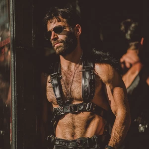 This is an outdoor photograph featuring a ginger muscular, adult...