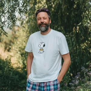 The image shows a 45 year old man muscle with a beard black hair...