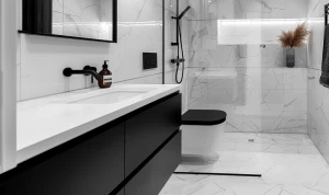 “Modern small black and white bathroom, matte black fixtures, wh...