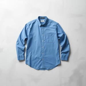 Create a minimalist flat lay composition with a classic blue shi...