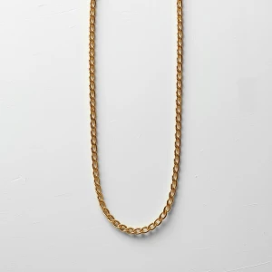 Create a minimalist flat lay composition with a gold thick chain...