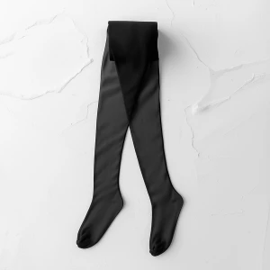 Design a minimalist flat lay scene featuring a pair of sheer bla...