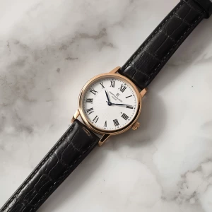 Design 1 elegant watch Place on a luxurious, marble-white backgr...