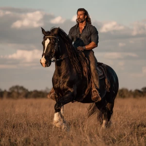 A bodybuilder man with a rugged beard and long brown hair, dress...