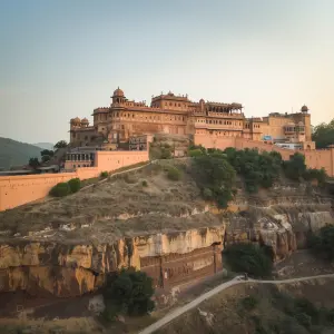 Create an image of an indian rajasthani palace on a cliff