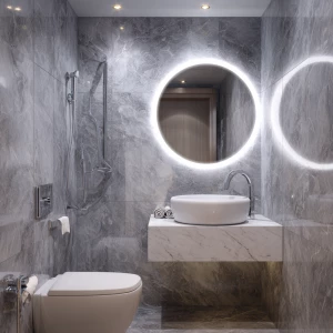 Create an image of a stylish, compact modern bathroom with grey...
