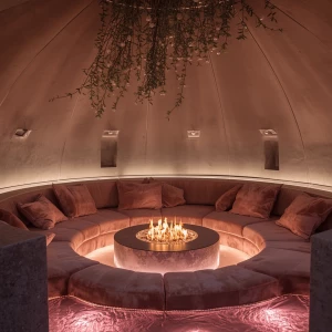 You find yourself in a sunken lounge known as The Roselight Pit,...