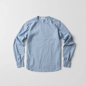 Produce an elegant flat lay image featuring a basic longsleeve l...